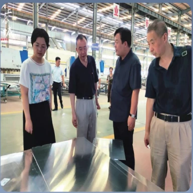 Visitors touring the facility