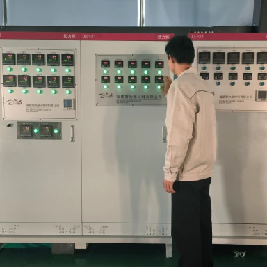 Technician monitoring production equipment